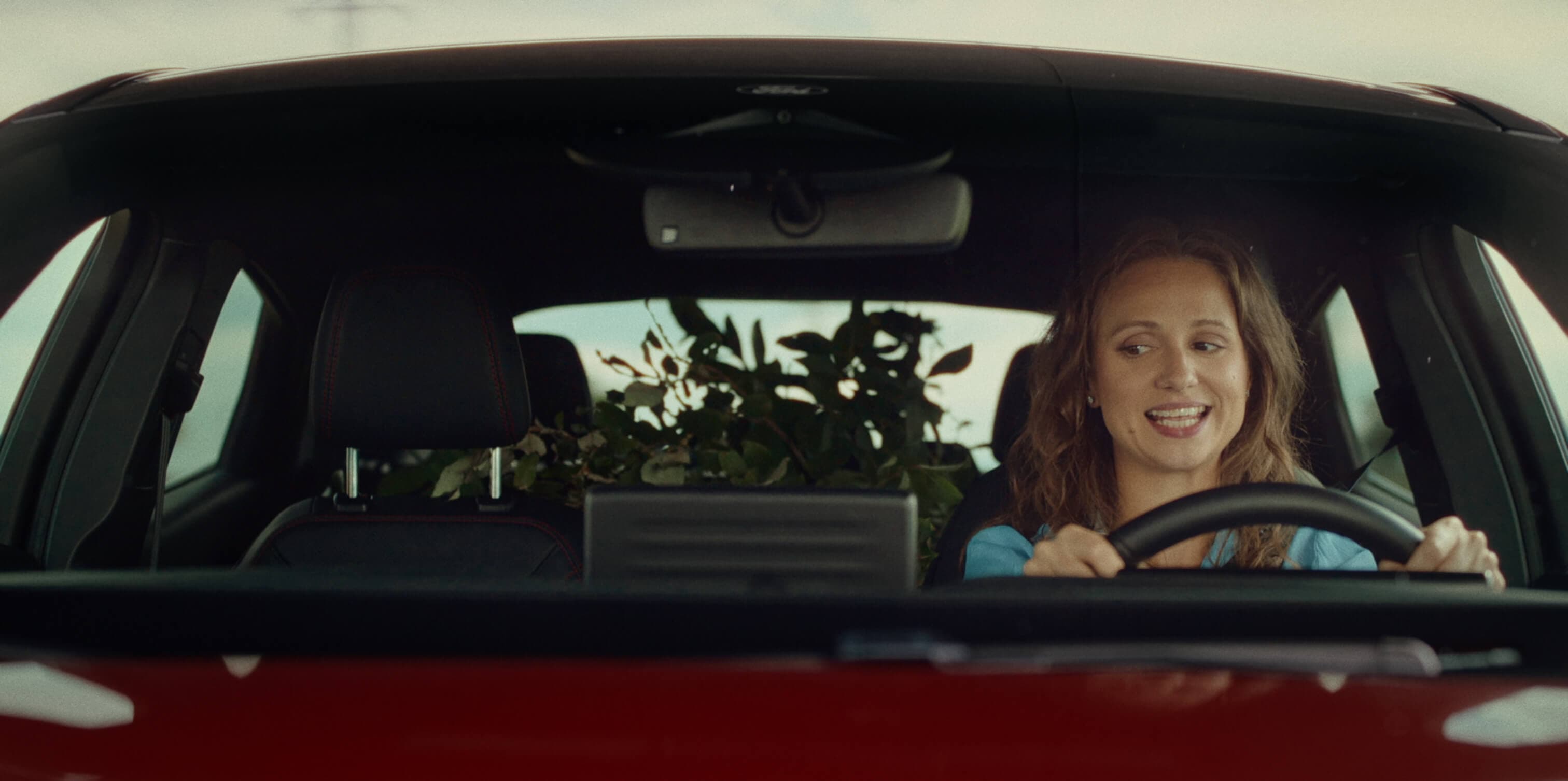 Scene from Ford Mustang Mach-E My First EV commercial — To Určitě Ano campaign directed and edited by Martin Marko, featured on CNN Prima and AutoRevue